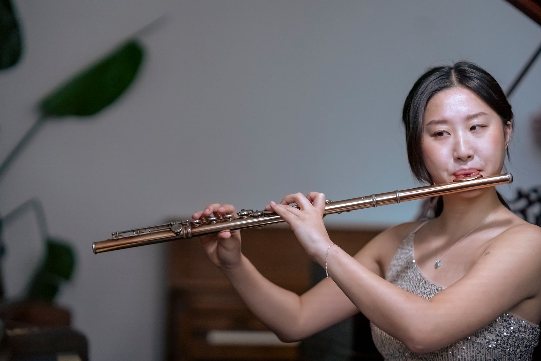 asian woman playing for performing live
